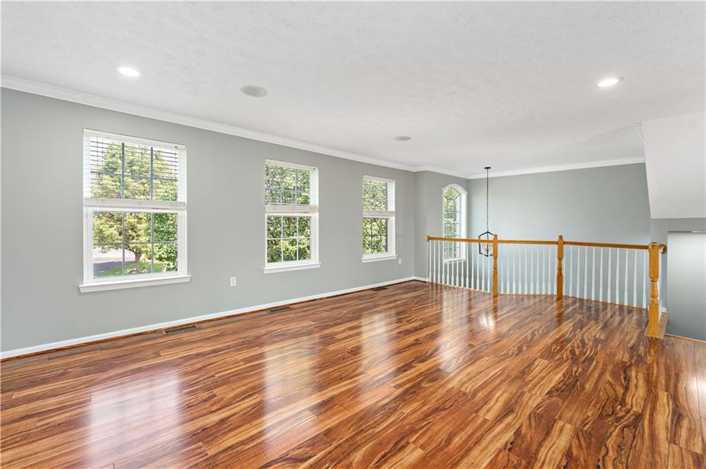 2000 Michael Drive Pittsburgh, PA 15227 - Photo 5 of 45 a view of an empty room with wooden floor and a window