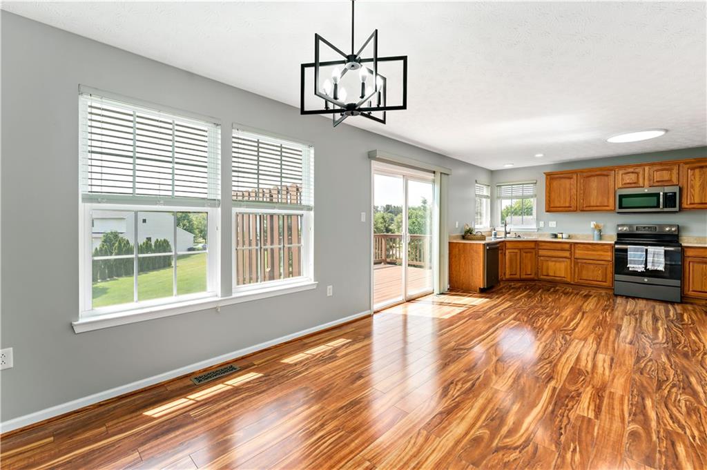 2000 Michael Drive Pittsburgh, PA 15227 - Photo 8 of 45 a view of a kitchen with a sink wooden floor and a window