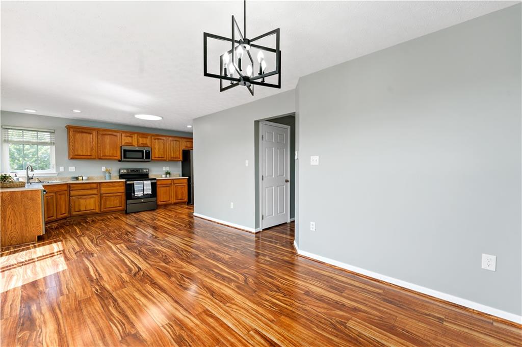 2000 Michael Drive Pittsburgh, PA 15227 - Photo 9 of 45 a view of a kitchen with wooden floor and a refrigerator