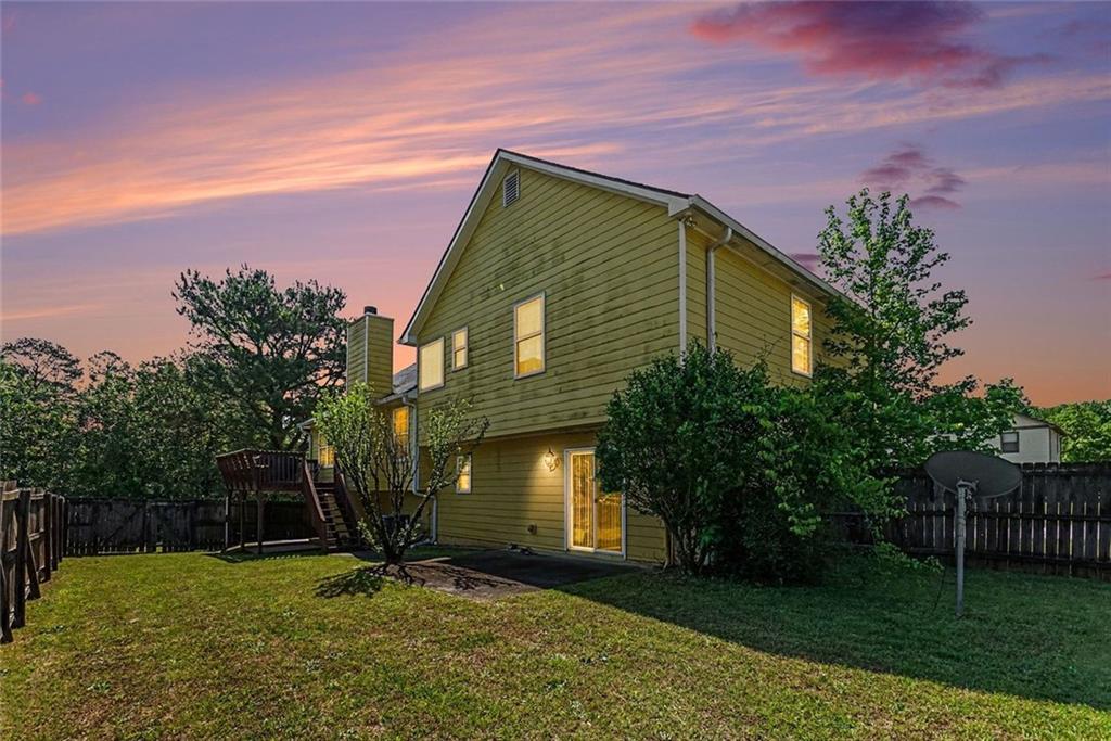 829 Dunes Way Austell, GA 30106 - Photo 28 of 28 a view of a house with a yard