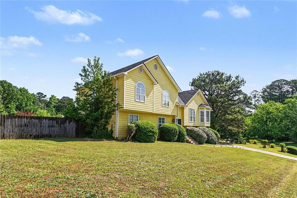 829 Dunes Way Austell, GA 30106 - Photo 5 of 28 a house view with a outdoor space