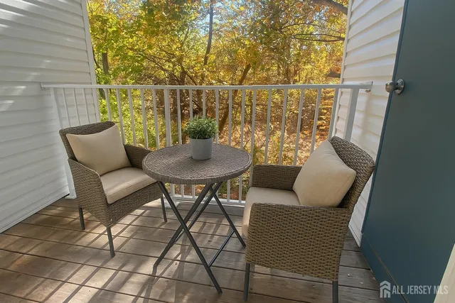 a outdoor living space with furniture and wooden floor