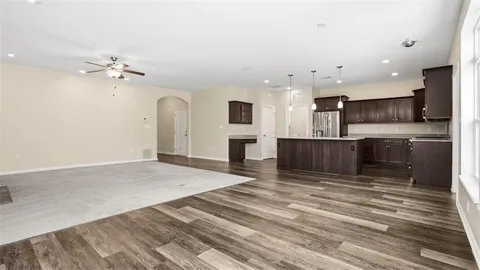 a view of a kitchen with a sink and a microwave