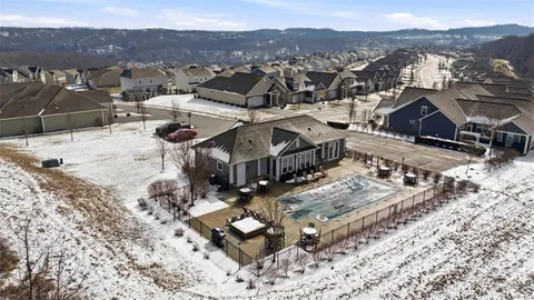 a view of a town with mountains in the background