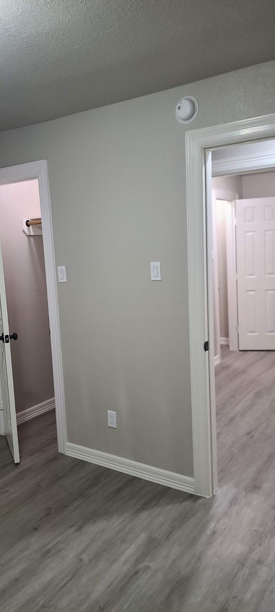 791 Fortune Street, Unit 4 Houston, TX 77088 - Photo 5 of 8 an empty room with wooden floor and entrance