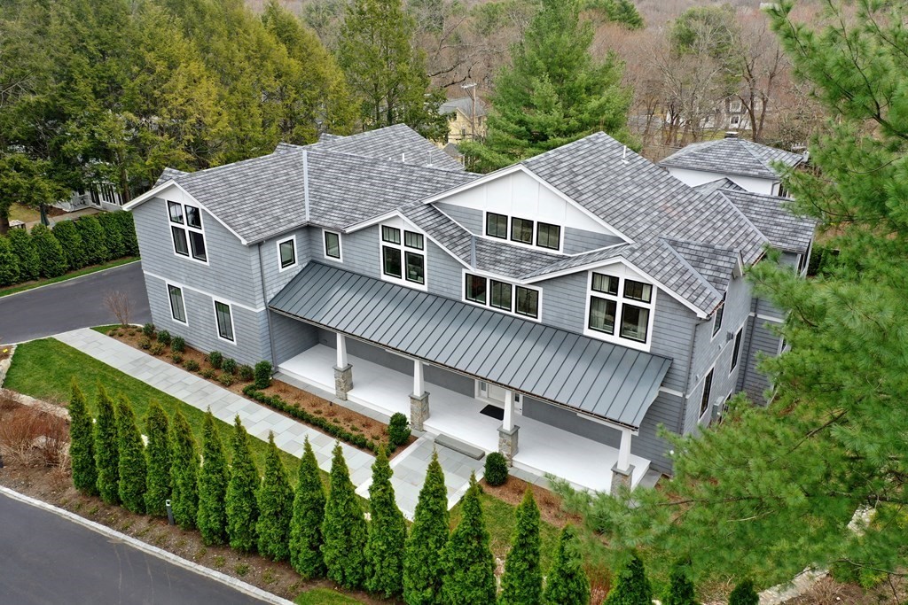 4 Dewing Path Wellesley, MA 02482 - Photo 1 of 41 aerial view of a house with a yard and potted plants