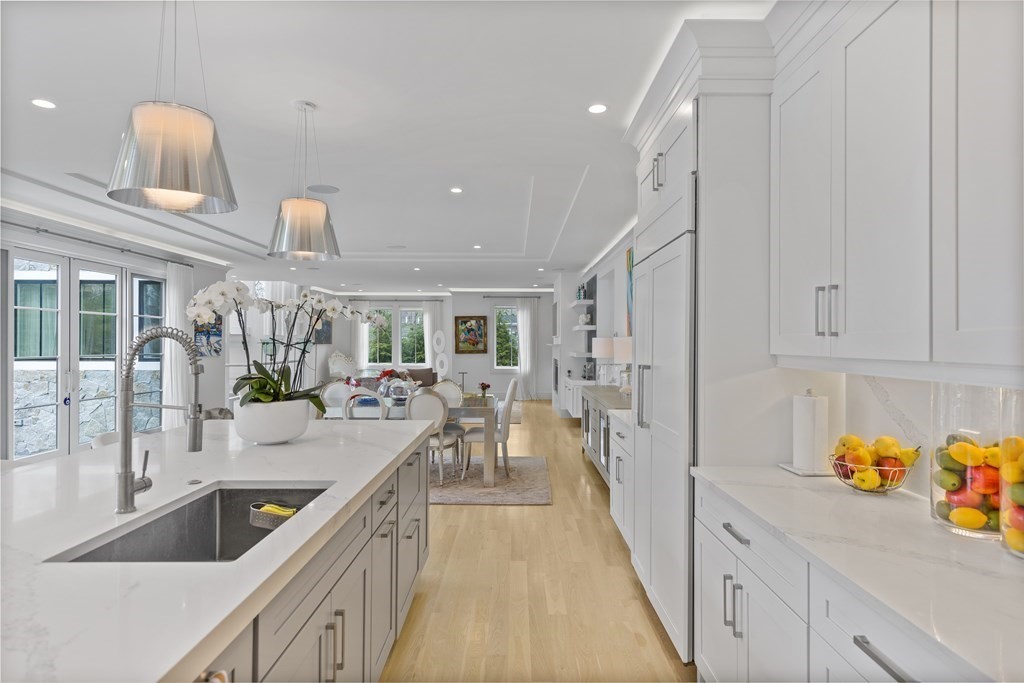 4 Dewing Path Wellesley, MA 02482 - Photo 14 of 41 a kitchen with counter top space and stainless steel appliances