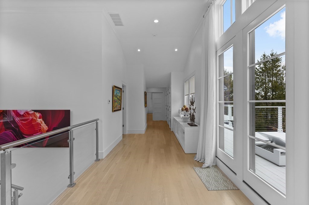 4 Dewing Path Wellesley, MA 02482 - Photo 21 of 41 a view of a hallway view with staircase