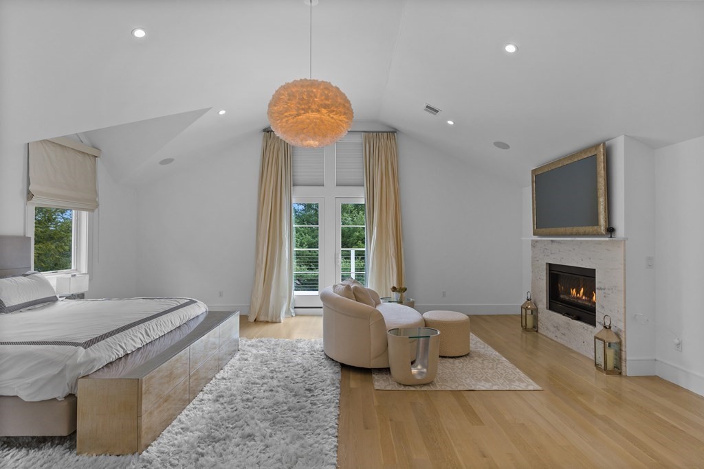 4 Dewing Path Wellesley, MA 02482 - Photo 23 of 41 a living room with furniture and a fireplace