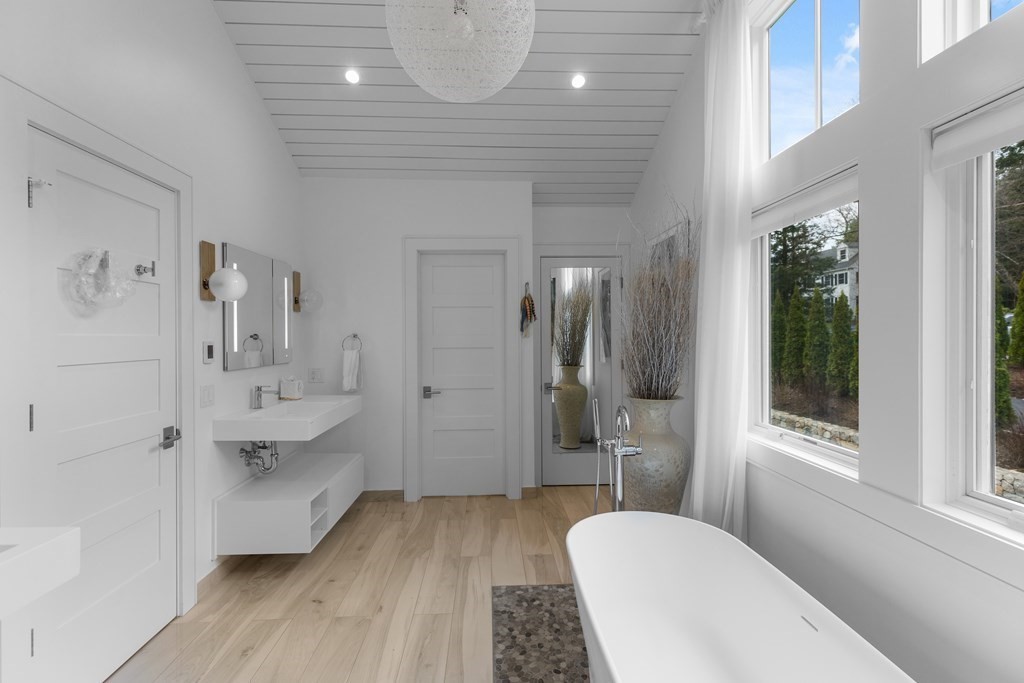 4 Dewing Path Wellesley, MA 02482 - Photo 26 of 41 a bathroom with a sink a toilet and shower