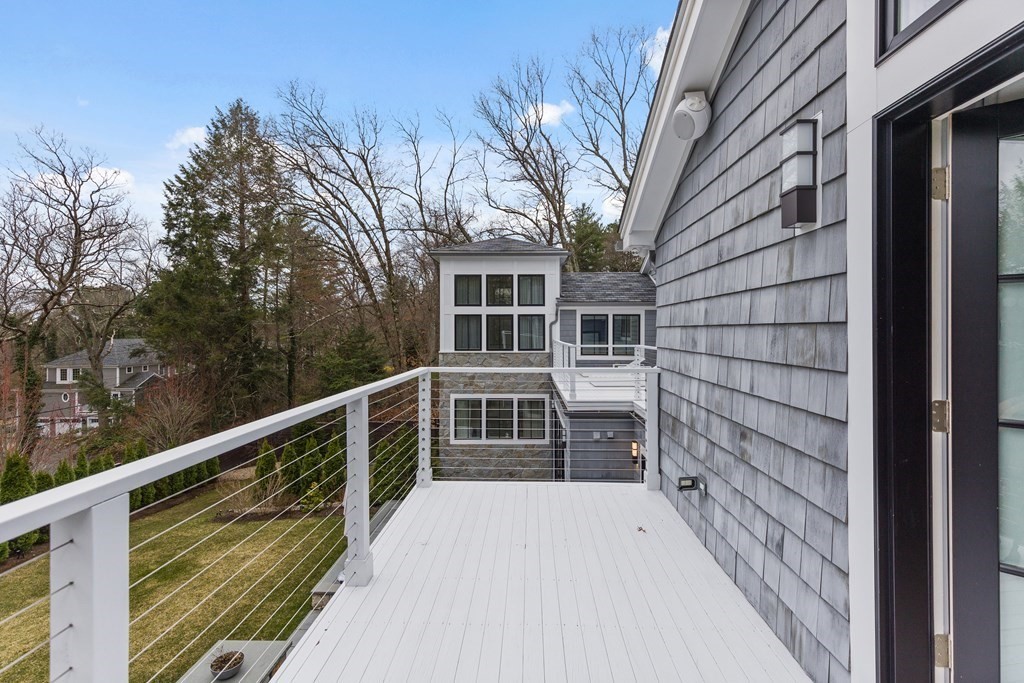 4 Dewing Path Wellesley, MA 02482 - Photo 27 of 41 a view of a balcony with an outdoor space