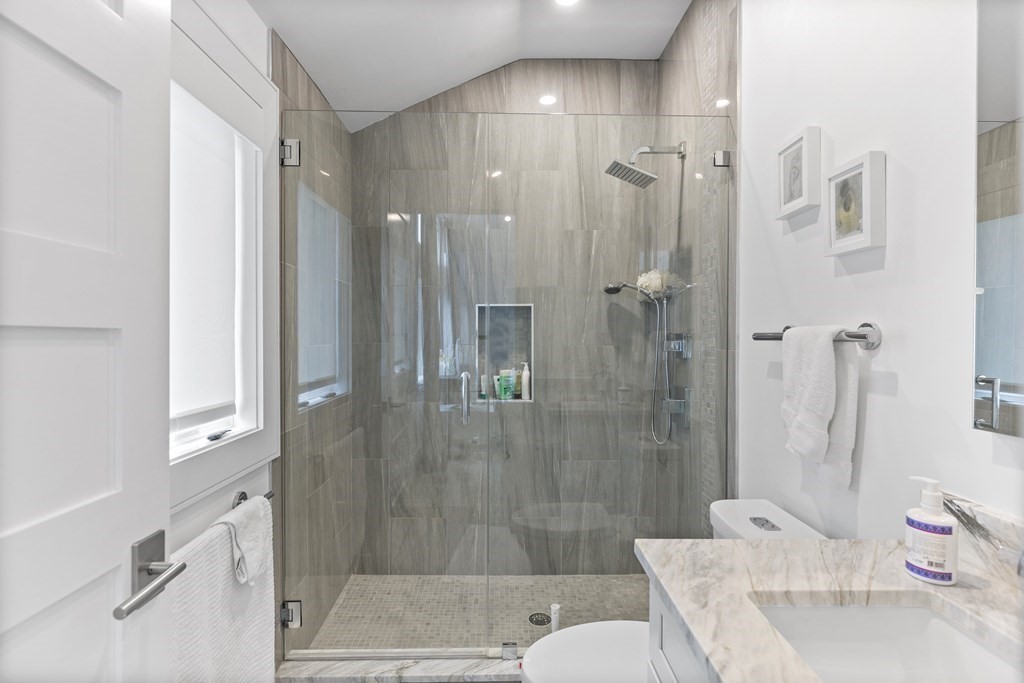 4 Dewing Path Wellesley, MA 02482 - Photo 29 of 41 a bathroom with a granite countertop bathtub shower sink and toilet