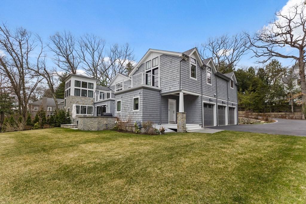 4 Dewing Path Wellesley, MA 02482 - Photo 3 of 41 a view of a yard in front of a house