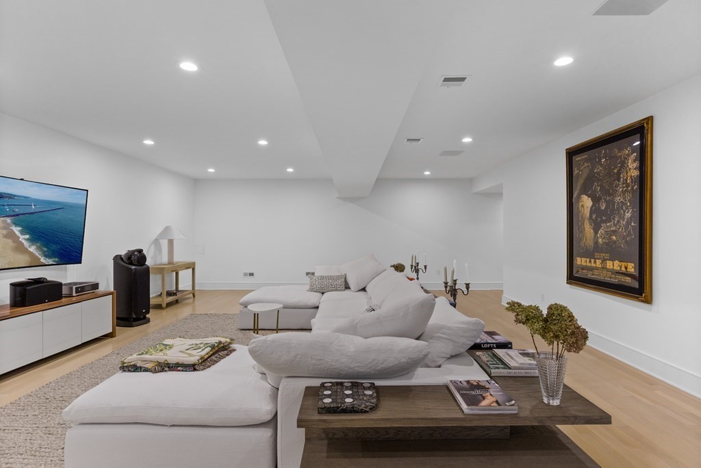 4 Dewing Path Wellesley, MA 02482 - Photo 38 of 41 a living room with furniture and a flat screen tv