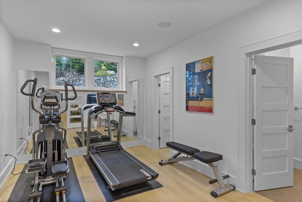 4 Dewing Path Wellesley, MA 02482 - Photo 40 of 41 a room with gym equipment and large mirror