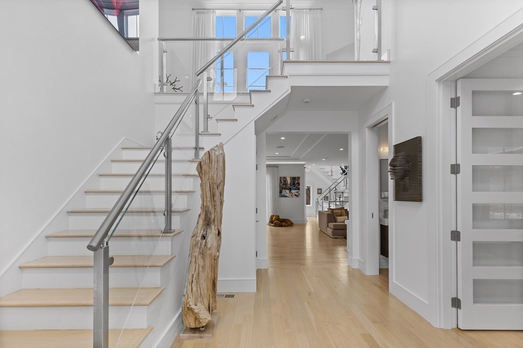 4 Dewing Path Wellesley, MA 02482 - Photo 5 of 41 a view of entryway and hall with wooden floor