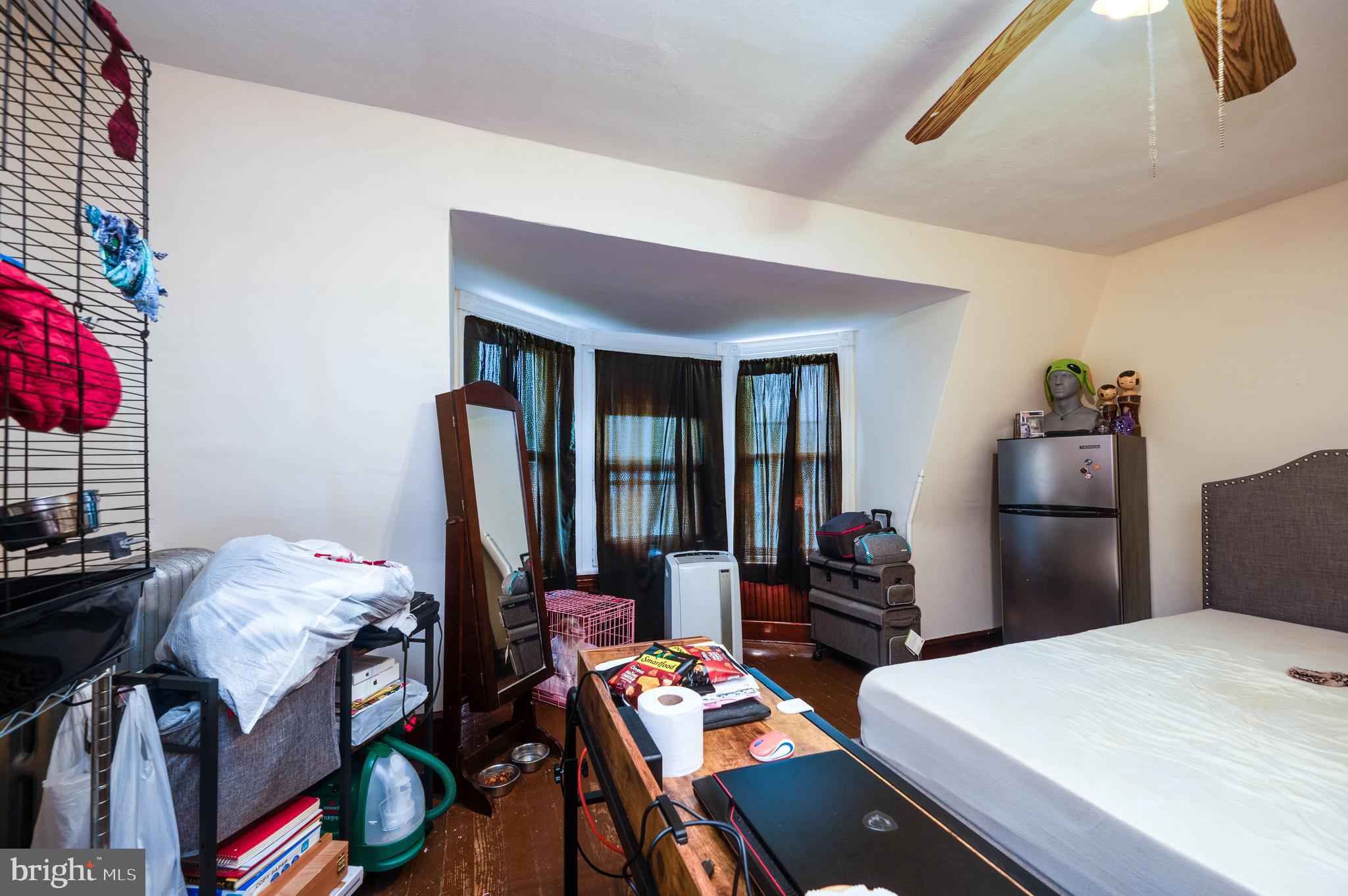 1032 North 5th Street Reading, PA 19601 - Photo 33 of 45 a bedroom with furniture and a dresser