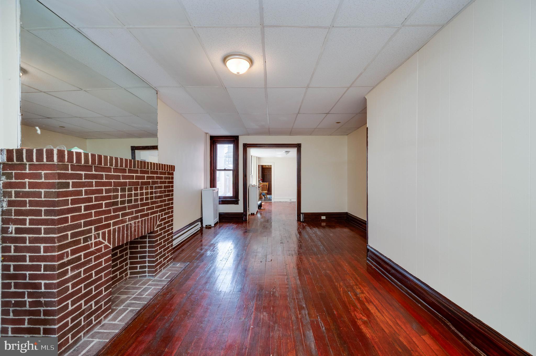 1032 North 5th Street Reading, PA 19601 - Photo 6 of 45 a view of hallway with wooden floor