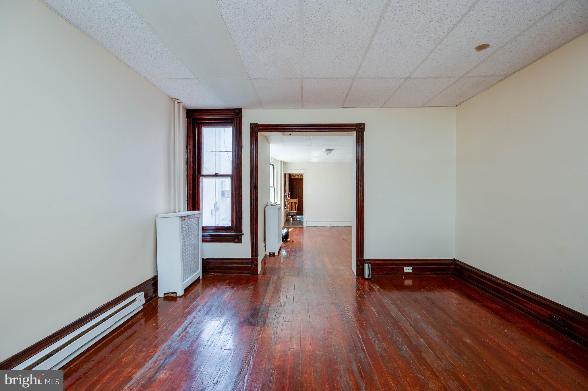 1032 North 5th Street Reading, PA 19601 - Photo 9 of 45 a view of empty room with wooden floor