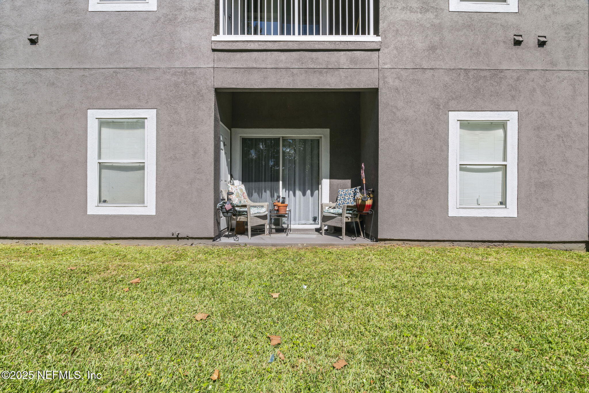 7920 Merrill Road, Unit 1206 Jacksonville, FL 32277 - Photo 20 of 35 a view of a livingroom with furniture