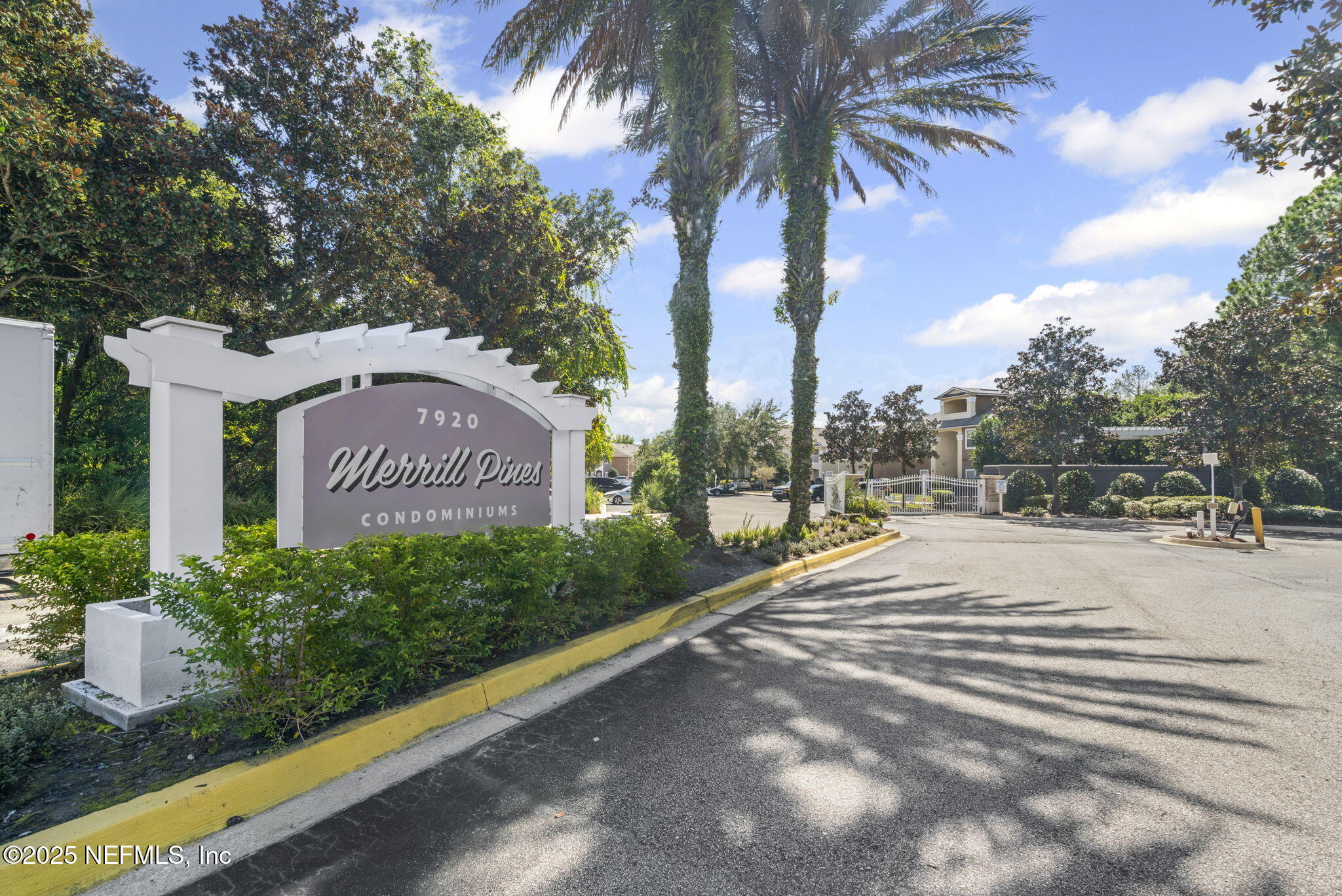 7920 Merrill Road, Unit 1206 Jacksonville, FL 32277 - Photo 27 of 35 a view of a street with a building in the background