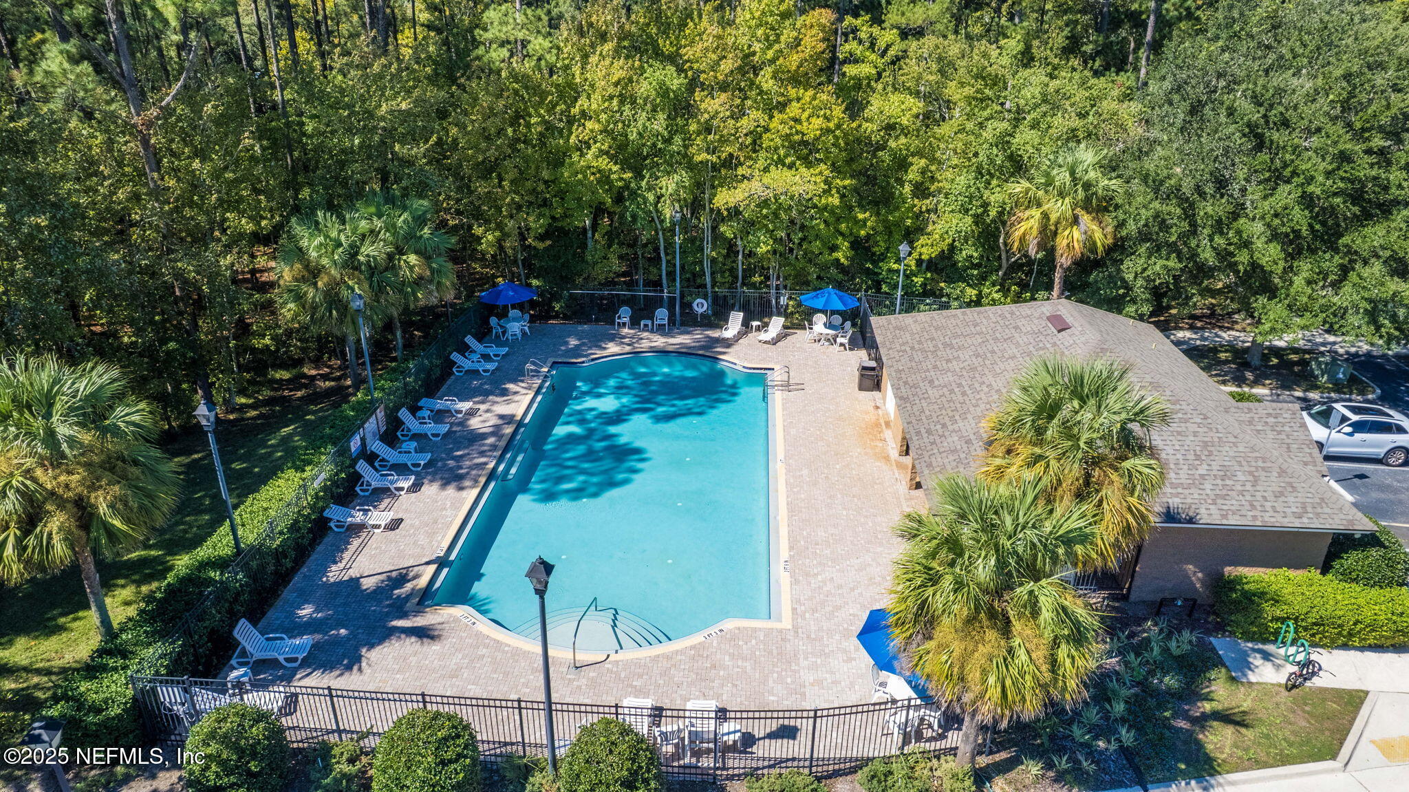 7920 Merrill Road, Unit 1206 Jacksonville, FL 32277 - Photo 28 of 35 an aerial view of house with yard