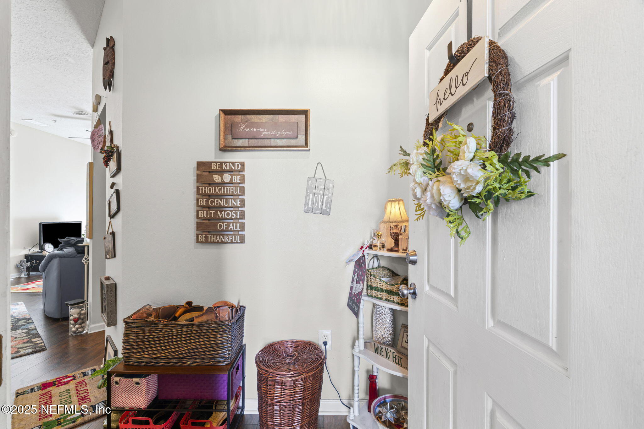 7920 Merrill Road, Unit 1206 Jacksonville, FL 32277 - Photo 3 of 35 a table with a vase and flowers on it