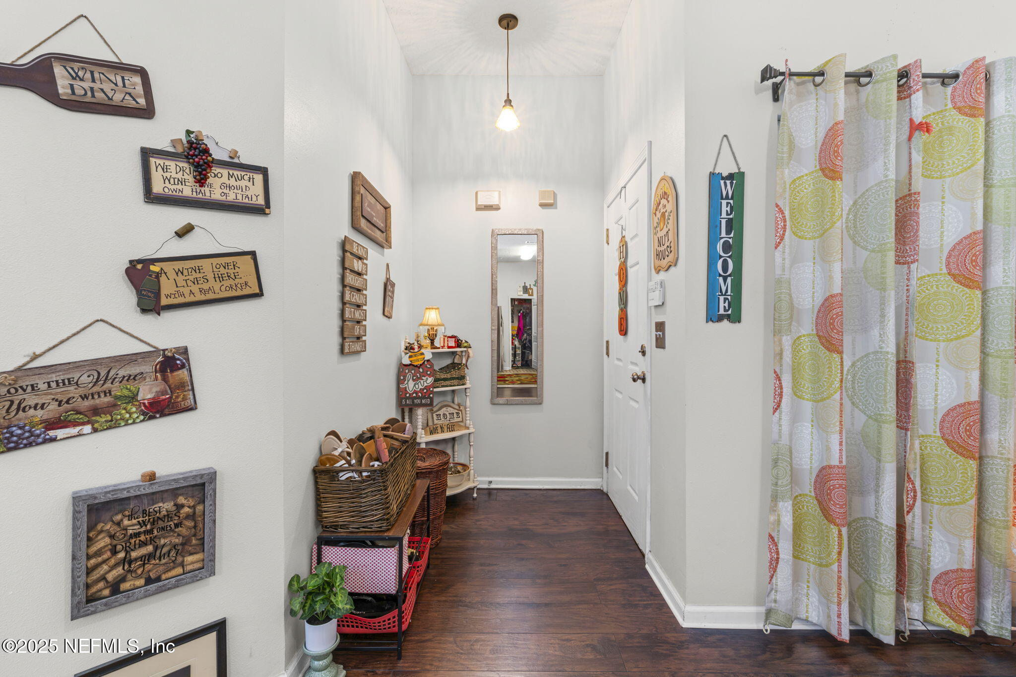7920 Merrill Road, Unit 1206 Jacksonville, FL 32277 - Photo 4 of 35 a view of entryway with wooden floor