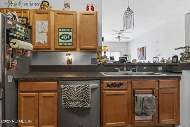 a kitchen with stainless steel appliances granite countertop a stove and a sink