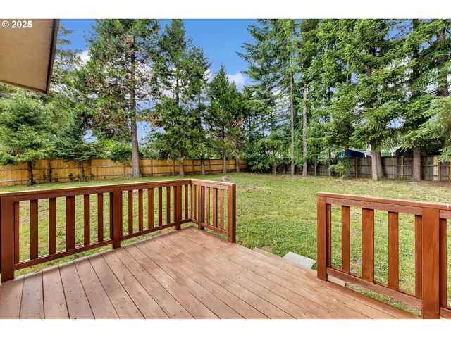 a view of deck with a lake view