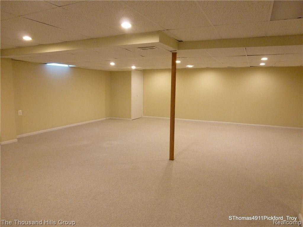 4911 Pickford Drive Troy, MI 48085 - Photo 41 of 46 FINISHED BASEMENT.