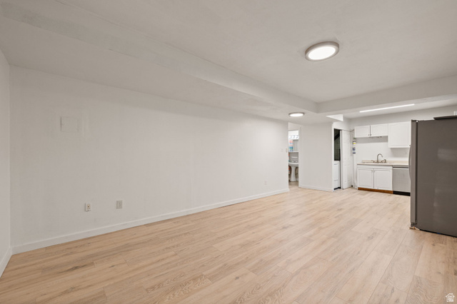 594 850 West Provo, UT 84601 - Photo 25 of 33 Bright open-concept space featuring wood-finish flooring, white walls, and recessed lighting