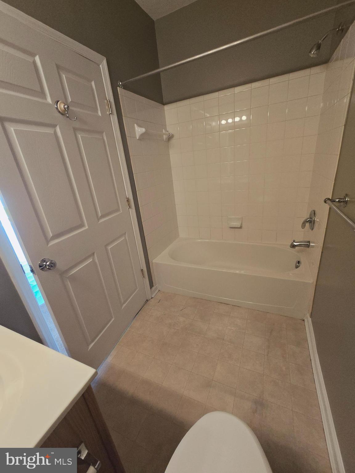 118 Heather Stone Way, Unit 80 Glen Burnie, MD 21061 - Photo 18 of 27 a bathroom with a shower and toilet