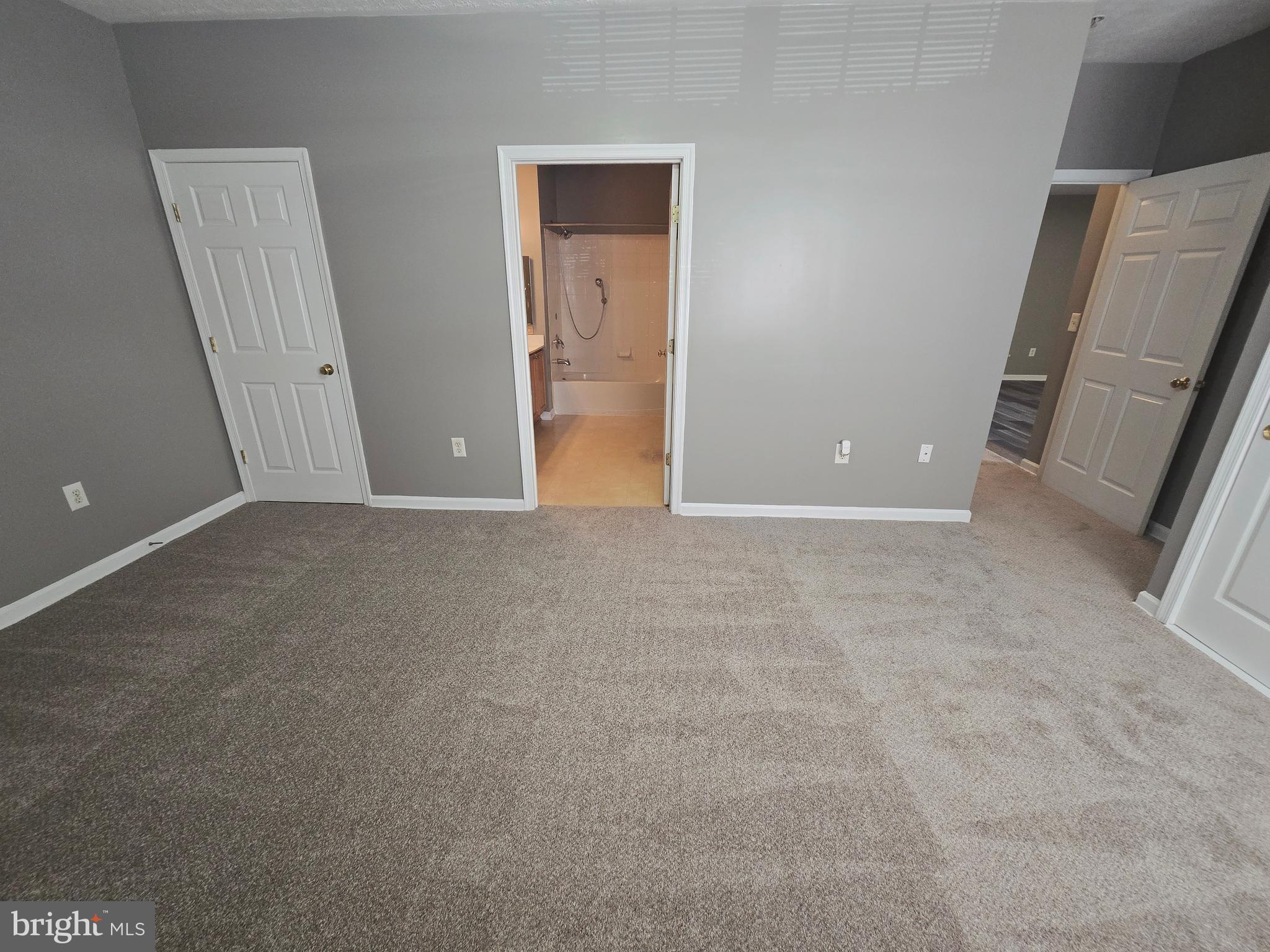 118 Heather Stone Way, Unit 80 Glen Burnie, MD 21061 - Photo 21 of 27 a view of an empty room with a fireplace