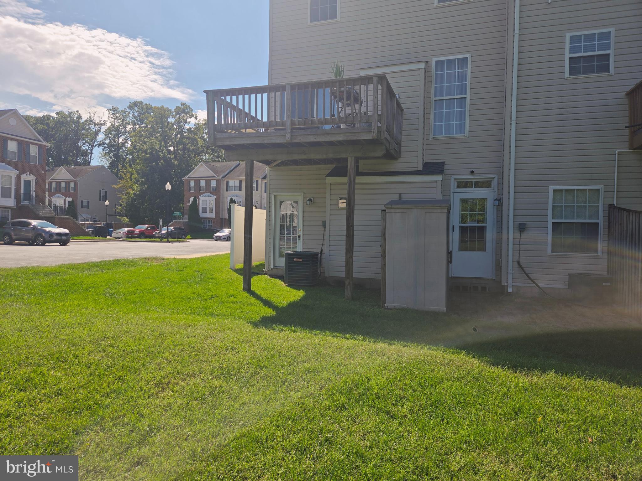 118 Heather Stone Way, Unit 80 Glen Burnie, MD 21061 - Photo 5 of 27 a view of a house with backyard and porch