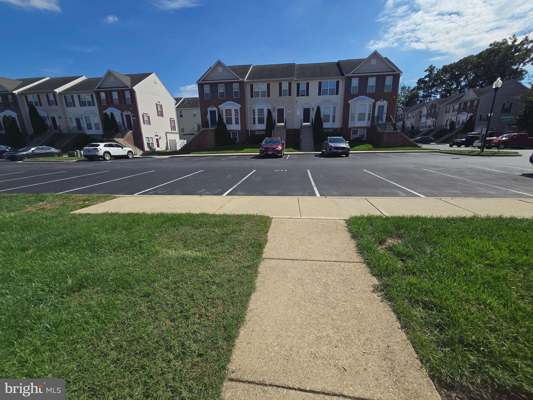 118 Heather Stone Way, Unit 80 Glen Burnie, MD 21061 - Photo 6 of 27 a view of a street with houses