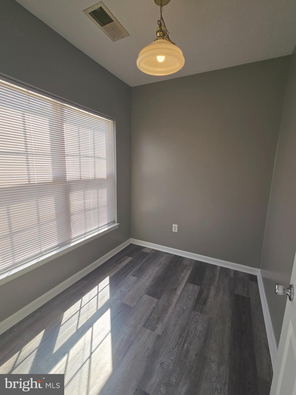 118 Heather Stone Way, Unit 80 Glen Burnie, MD 21061 - Photo 10 of 27 a view of an empty room with a window