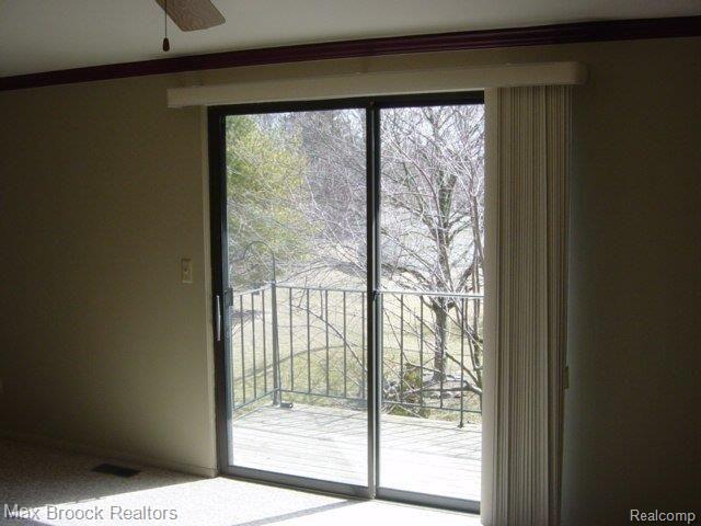 1979 Pondview Court, Unit 80 Rochester, MI 48309 - Photo 12 of 25 Master Bedroom Balcony Access