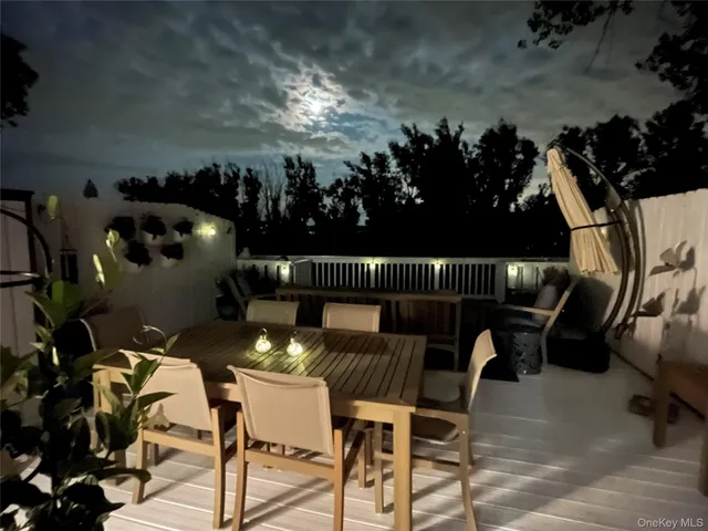 a view of a dinning tables and chairs in patio