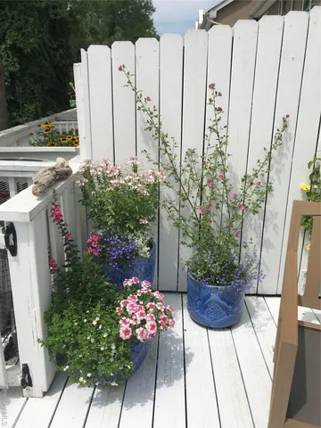a view of a chairs and tables in the patio