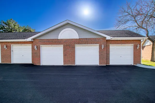 a view of a house with a garage