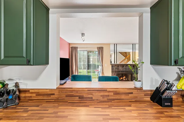a view of living room with furniture and floor to ceiling window