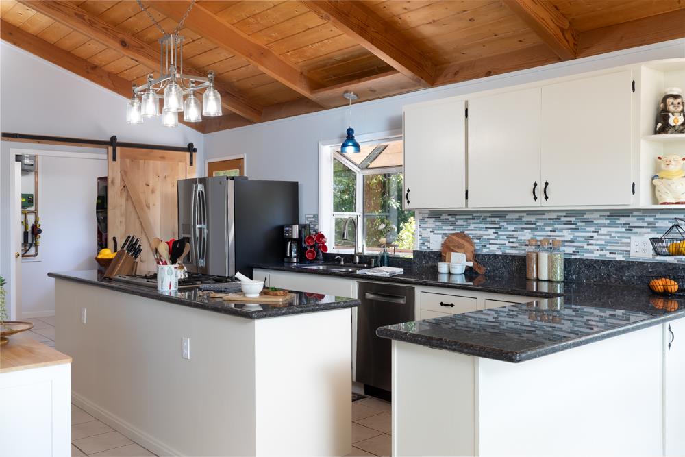 708 Ralston Ridge Boulder Creek, CA 95006 - Photo 13 of 59 a kitchen with stainless steel appliances granite countertop a sink stove and refrigerator