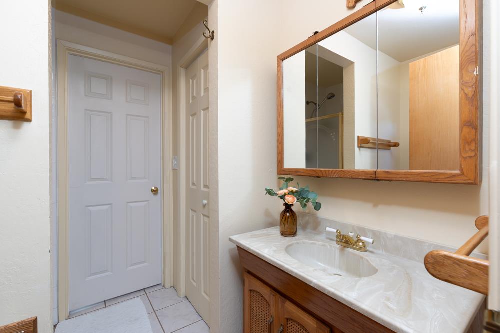 708 Ralston Ridge Boulder Creek, CA 95006 - Photo 19 of 59 a bathroom with a sink and a mirror