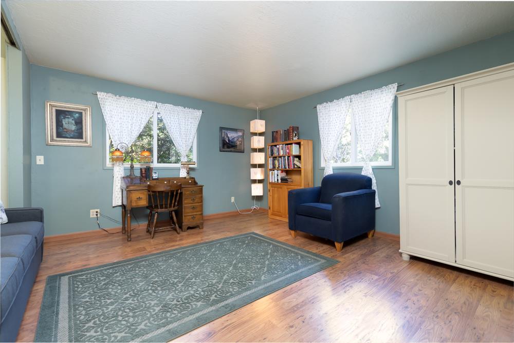 708 Ralston Ridge Boulder Creek, CA 95006 - Photo 21 of 59 a living room with furniture and a wooden floor