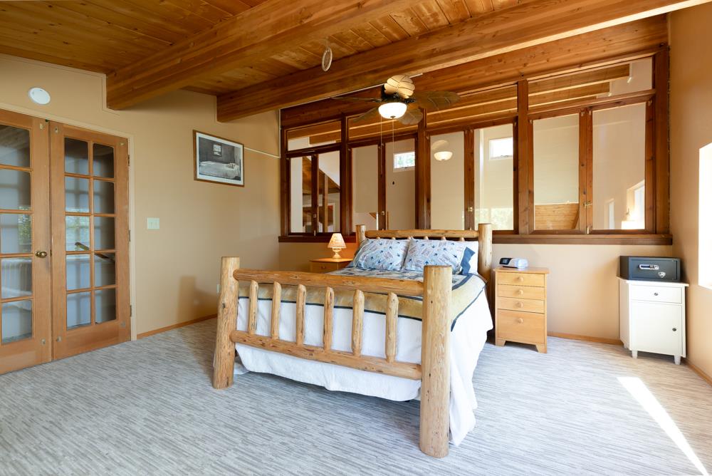 708 Ralston Ridge Boulder Creek, CA 95006 - Photo 24 of 59 a view of a bedroom with furniture and windows