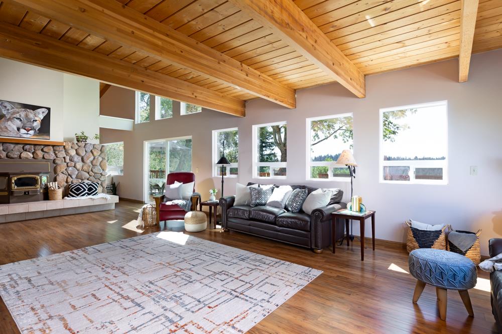 708 Ralston Ridge Boulder Creek, CA 95006 - Photo 8 of 59 a living room with furniture and a fireplace
