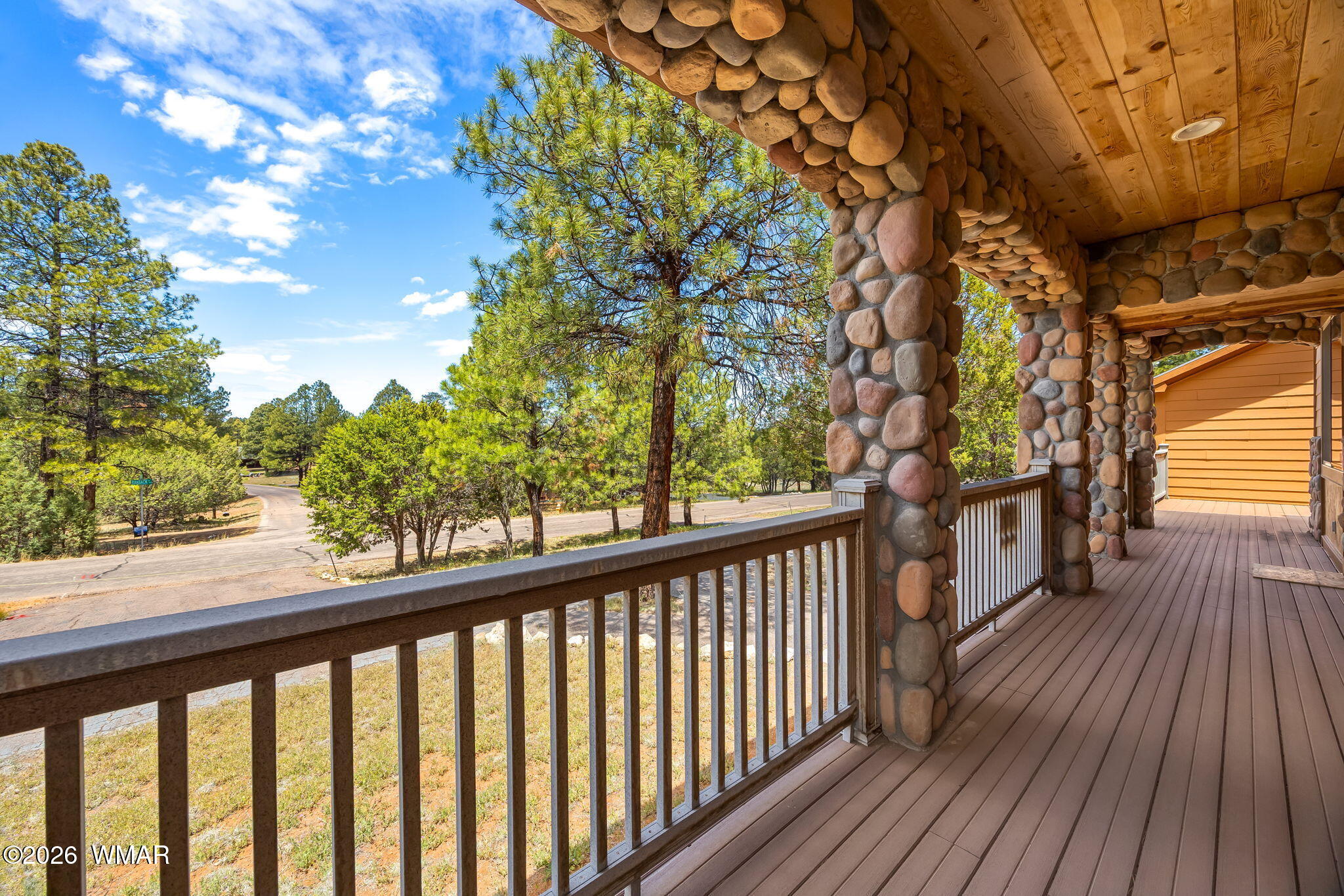 2937 Ransack Road Overgaard, AZ 85933 - Photo 3 of 34 a view of a balcony with wooden floor