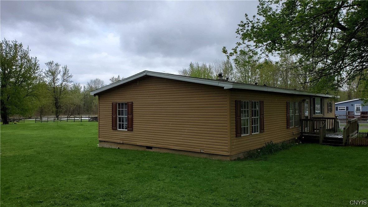 1641 Fyler Road Sullivan, NY 13037 - Photo 27 of 27 Left side of house. Vinyl sided exterior.