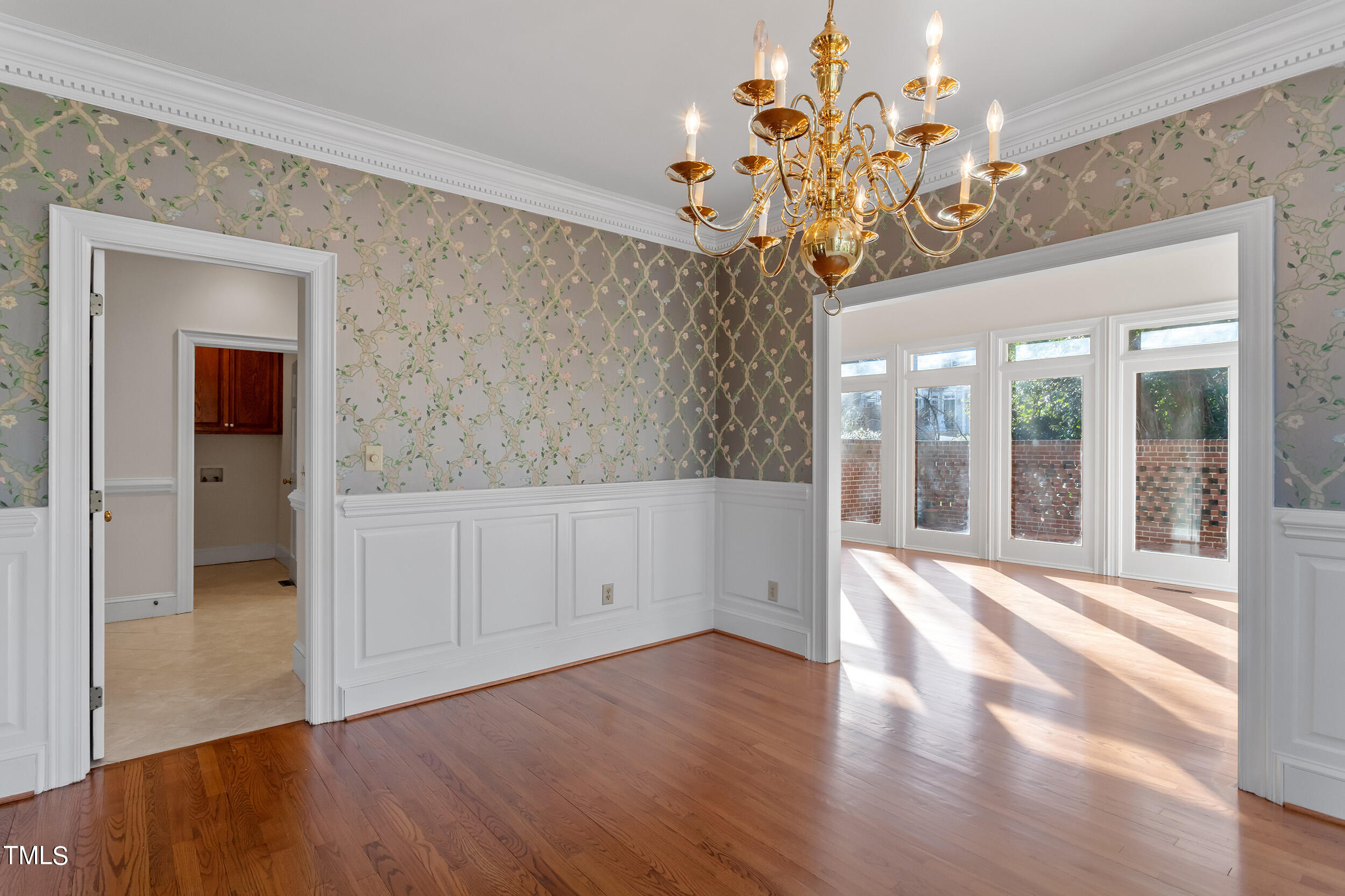 2617 Tatton Drive Raleigh, NC 27608 - Photo 13 of 41 wooden floor in an empty room with a window